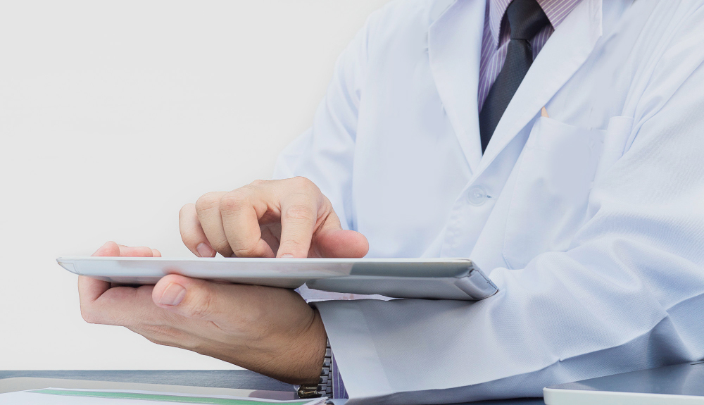 doctor-is-working-with-tabl
